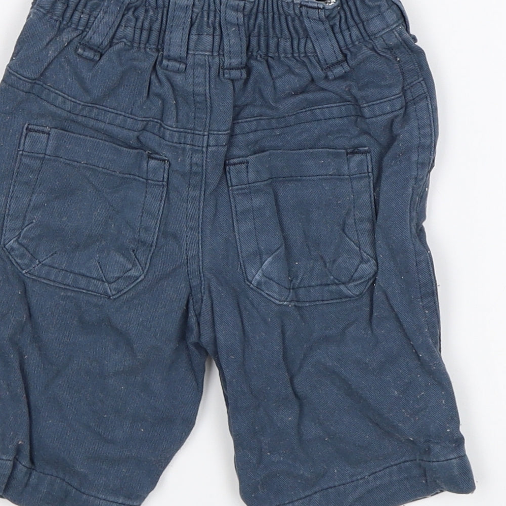 Brand and care label for Cherokee Baby Blue Capri Trousers, size 0-3, Months
