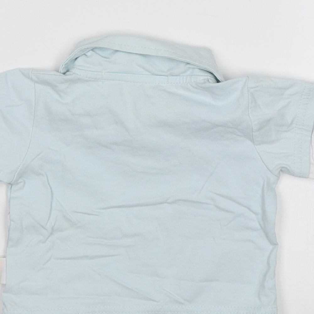 Brand and care label for Nursery Time Baby Blue Basic Polo, size 0-3, Months - Shark patrol