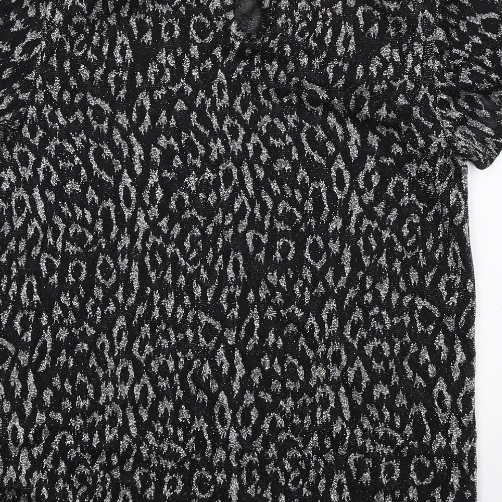 Brand and care label for Primark girls’ black basic blouse, size 12-13, years