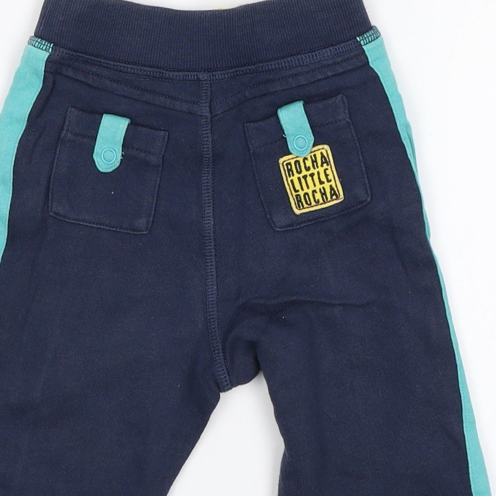 Brand and care label for Rocha Little Rocha Baby Blue sweatpants, size 3-6, Months