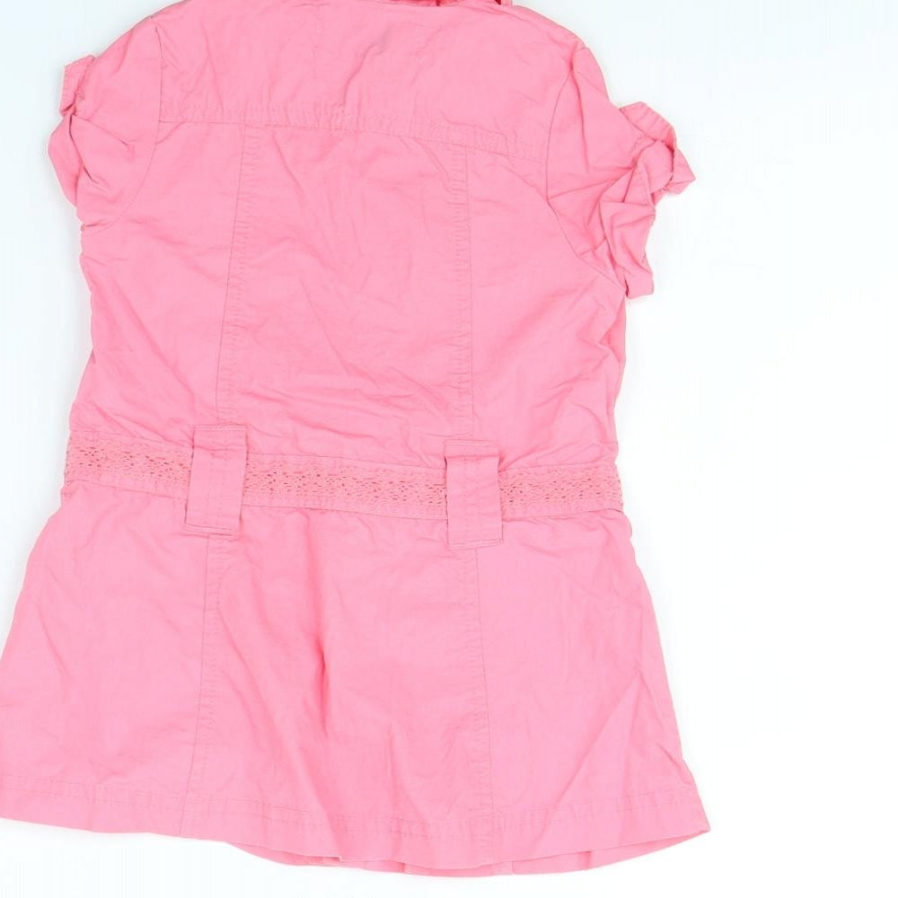 Brand and care label for Early Days girls’ pink pinafore/dungaree dress, size 6-9, months