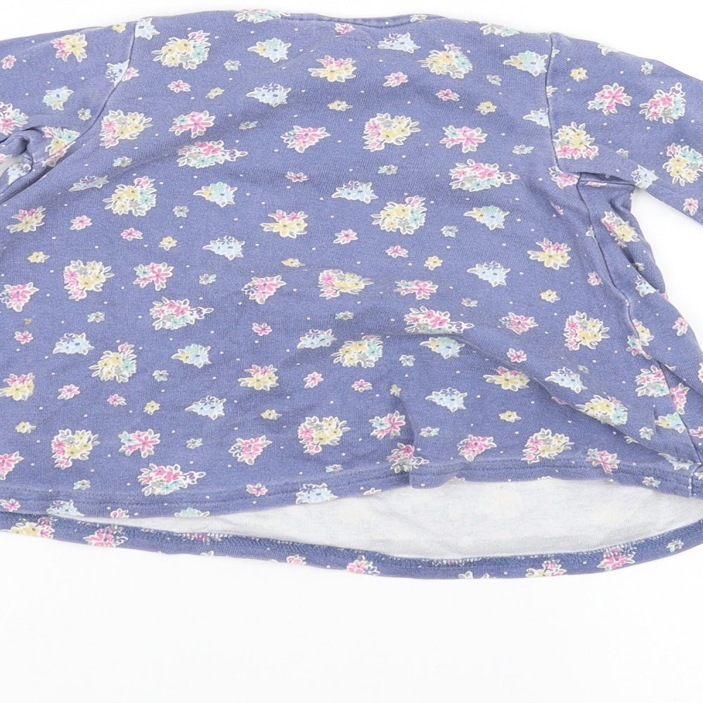 Brand and care label for Next girls’ blue floral a-line, size 6-9, months