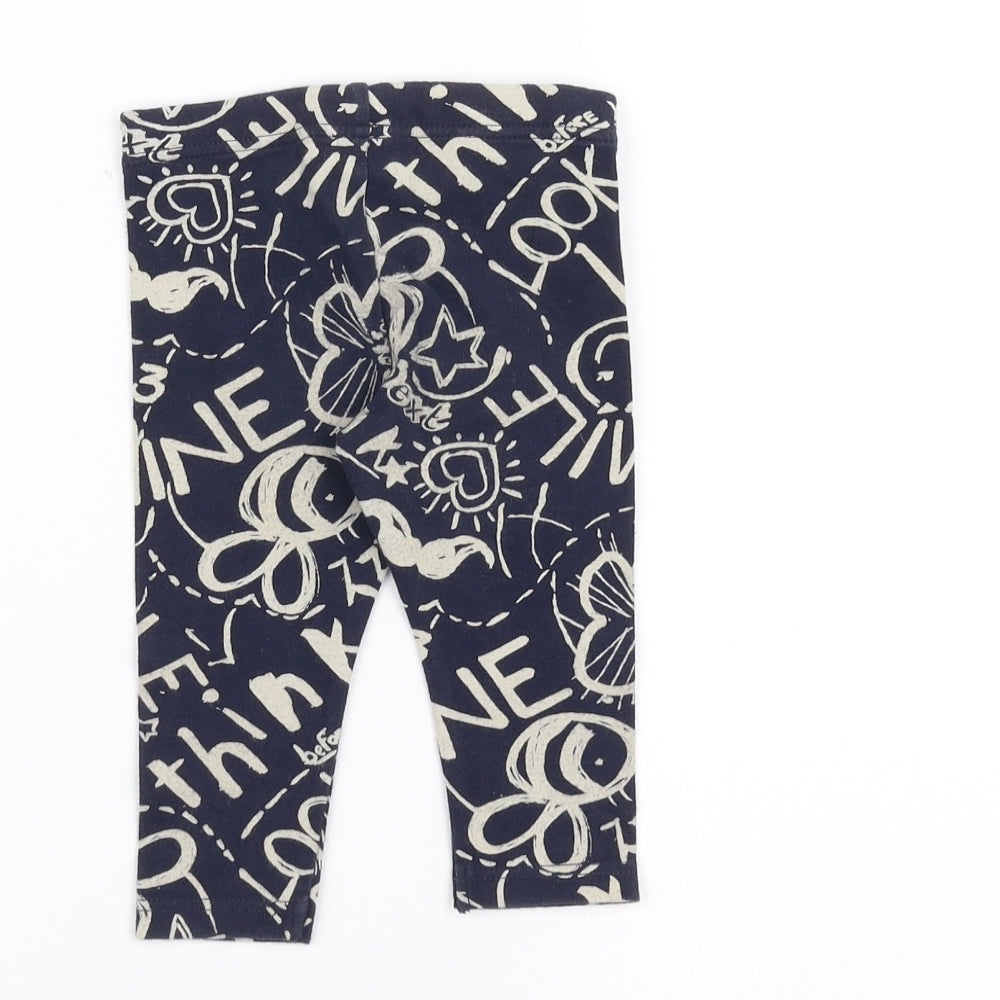 Brand and care label for Next Baby Blue sweatpants, size 6-9, Months