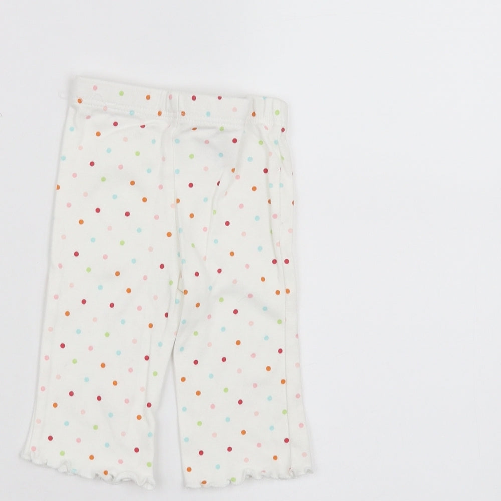Brand and care label for Marks & Spencer Baby White Polka Dot sweatpants, size 0-3, Months