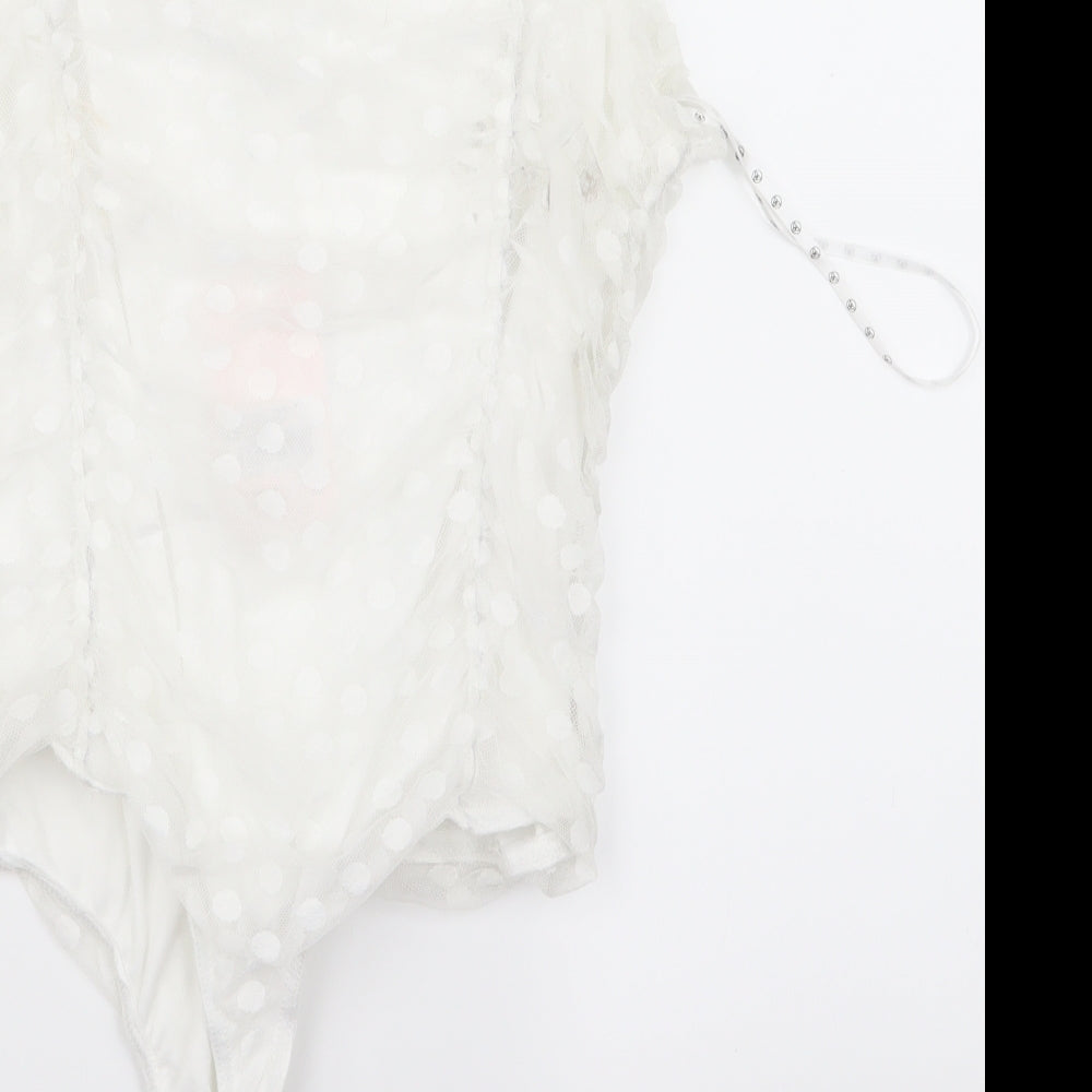 Brand and care label for Preworn women’s white cropped blouse, size UK 12