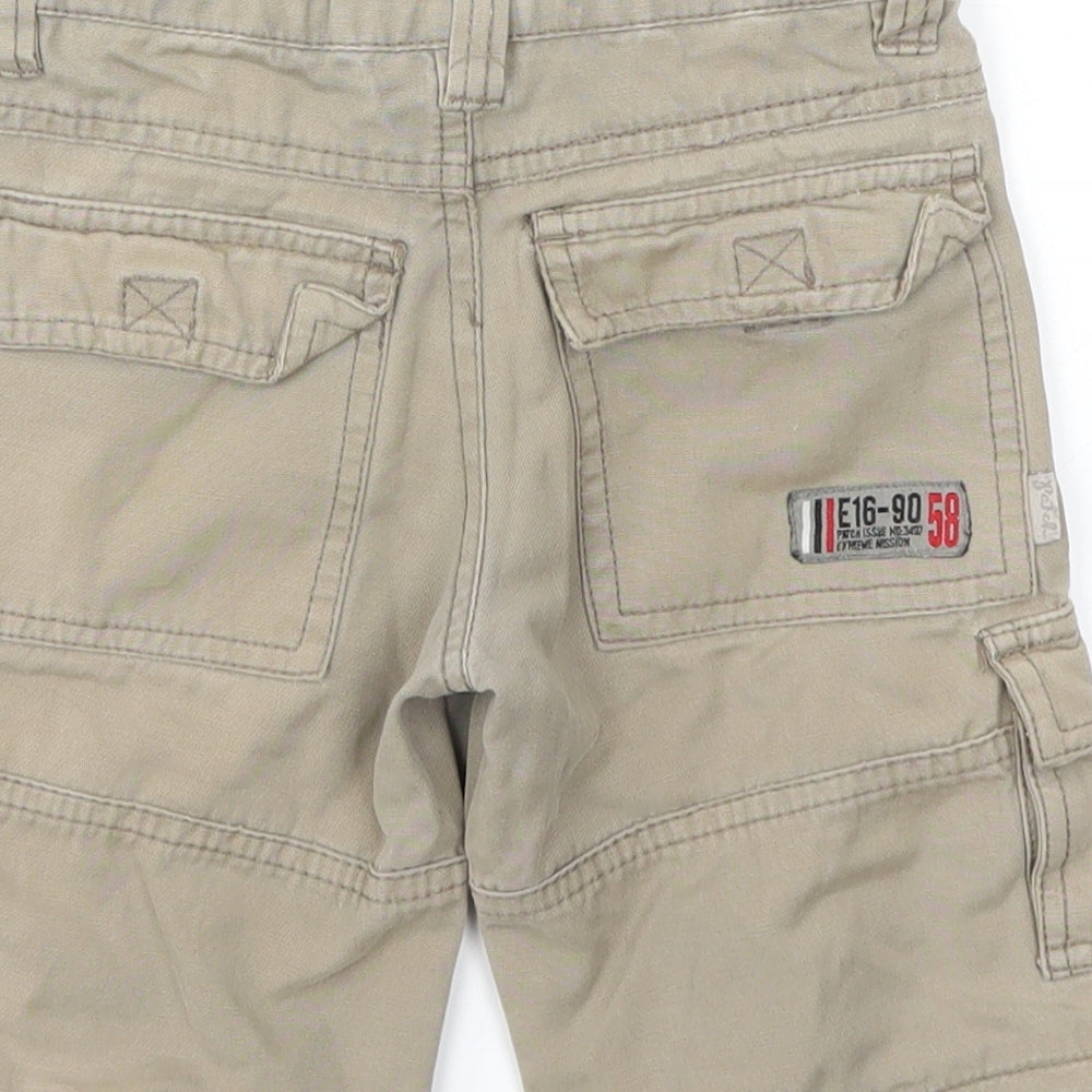 Brand and care label for PUMKIN PATCH boys’ beige capri trousers, size 24, months