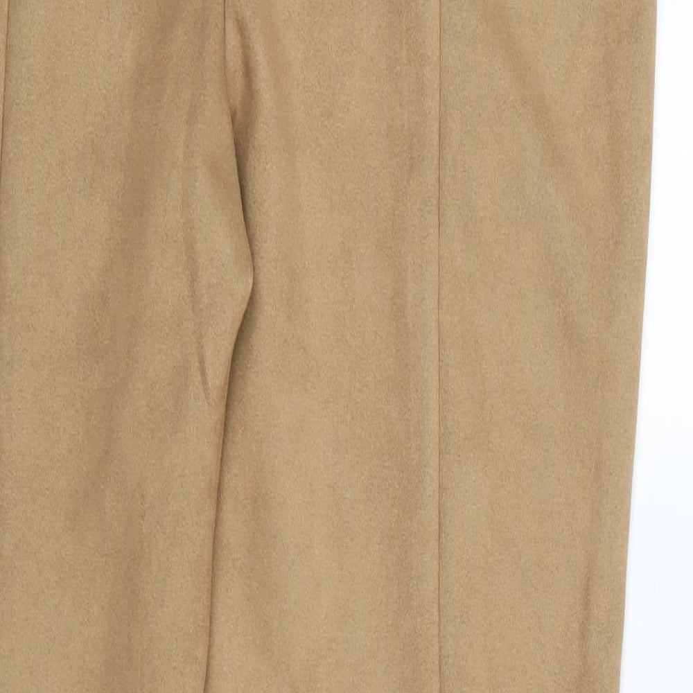 Brand and care label for In the Style women’s beige trousers, size UK 16, 30.5-inch leg
