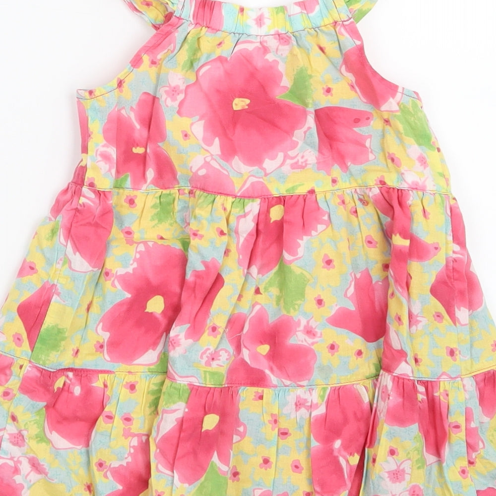 Brand and care label for Mothercare girls’ pink floral t-shirt dress, size 9-12, months