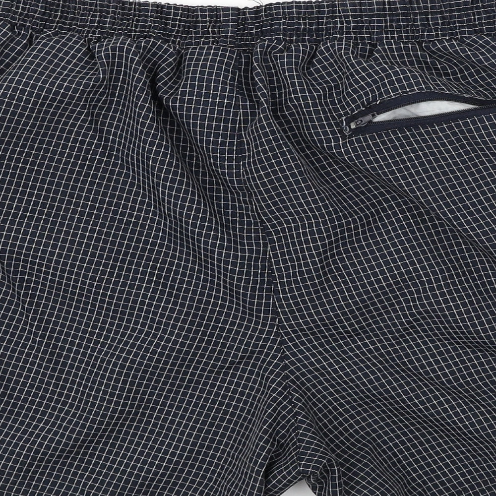 Brand and care label for OCV men’s grey check bermuda shorts, size L