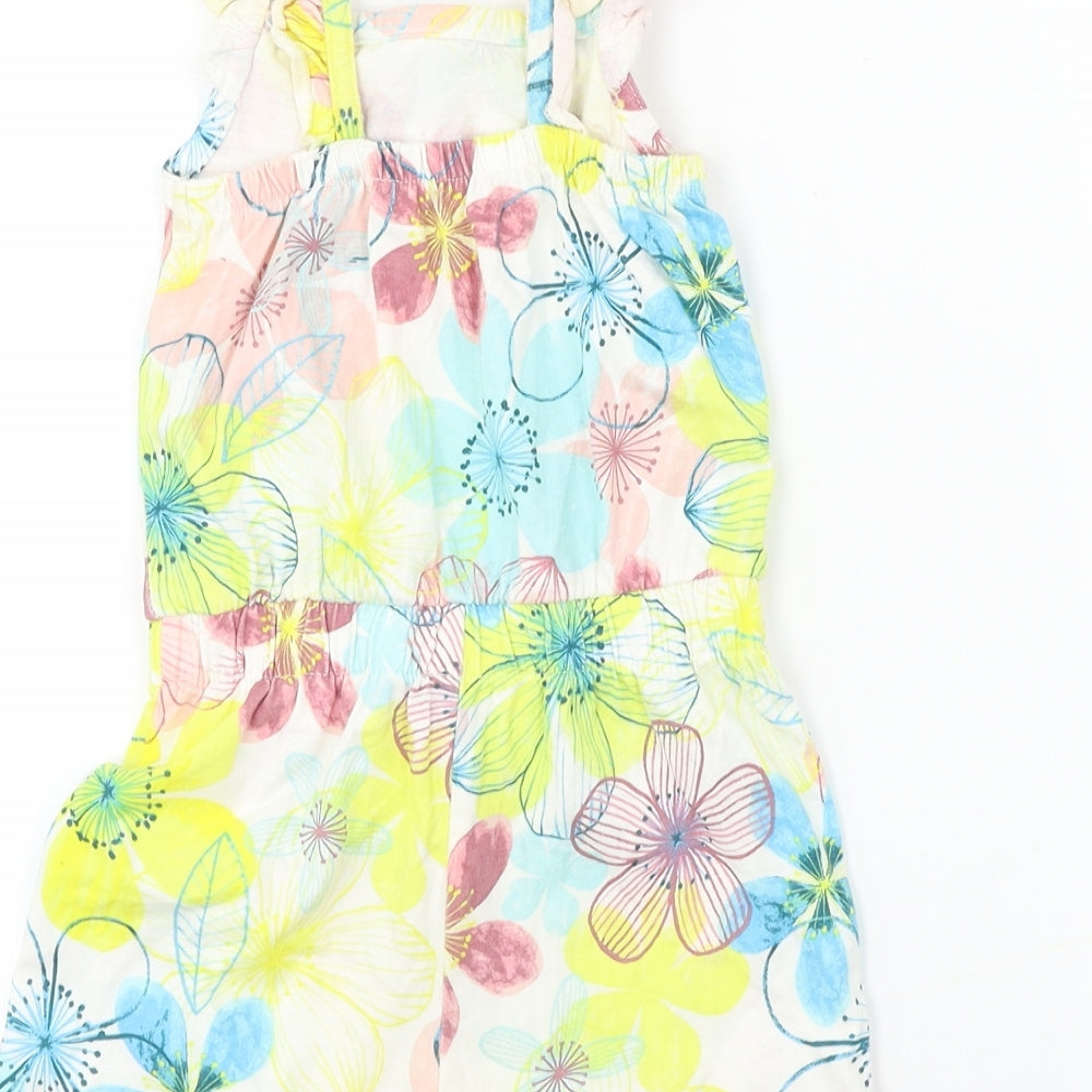 Brand and care label for George girls’ white floral jumpsuit one-piece, size 2, years