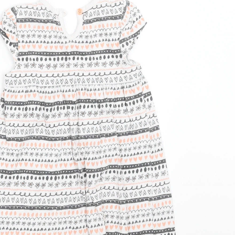 Brand and care label for George girls’ white geometric t-shirt dress, size 12-18, months
