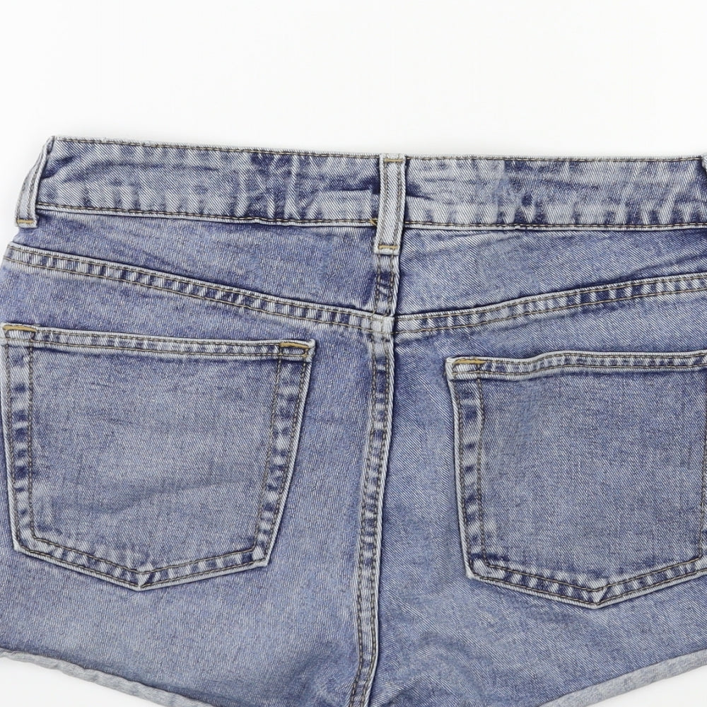 Brand and care label for Topshop women’s blue hot pants shorts, size UK 28, in
