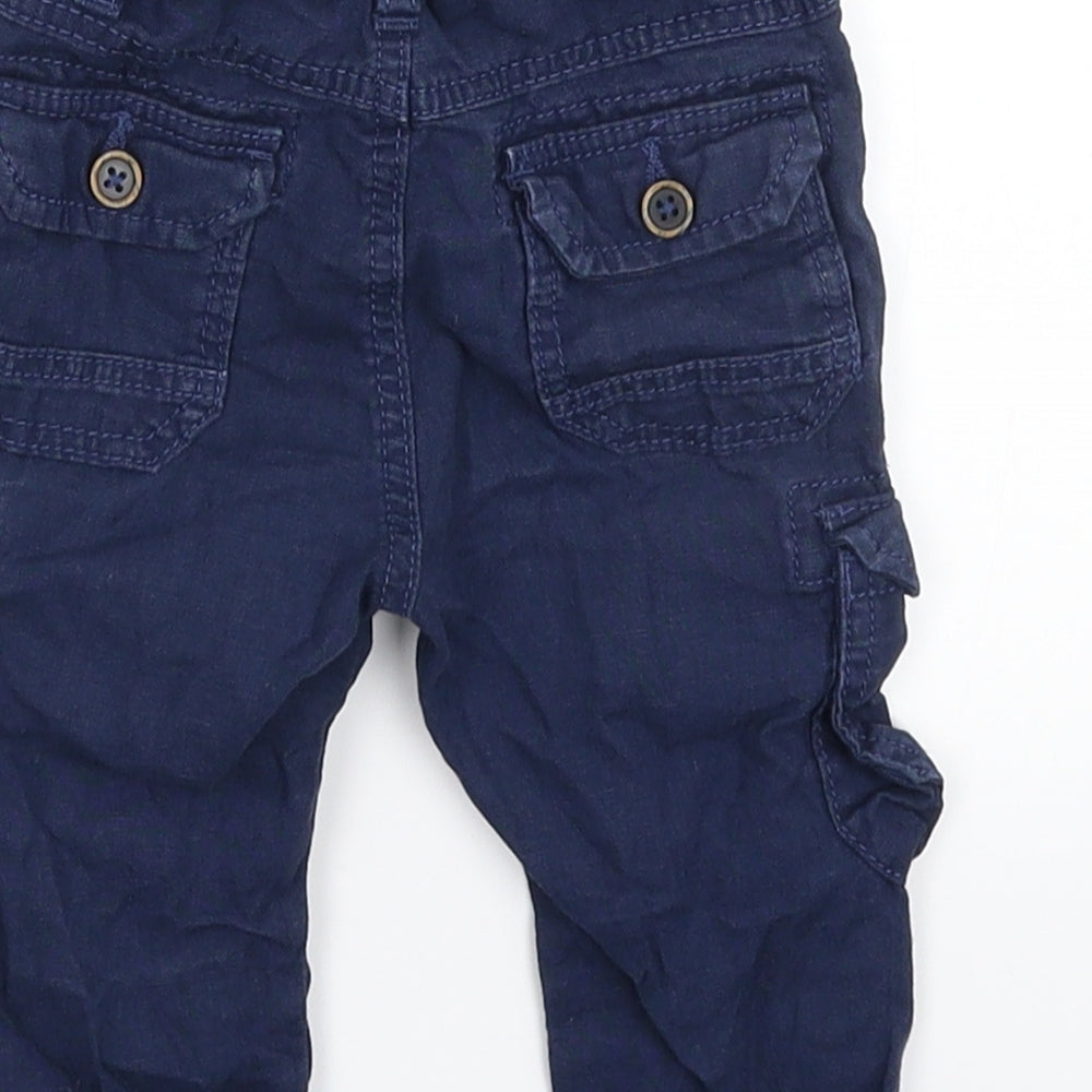 Brand and care label for Marks & Spencer Baby Blue Cargo Trousers, size 6-9, Months