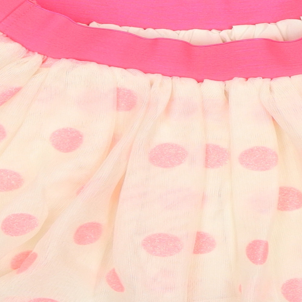Brand and care label for H&M girls’ pink polka dot swing skirt, size 2-3, years
