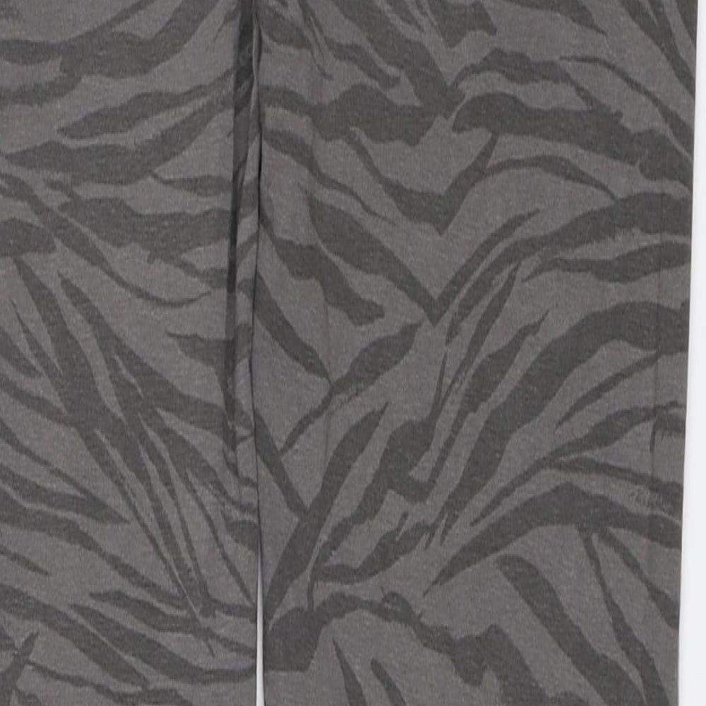 Brand and care label for Tu girls’ grey animal print jegging trousers, size 12, years