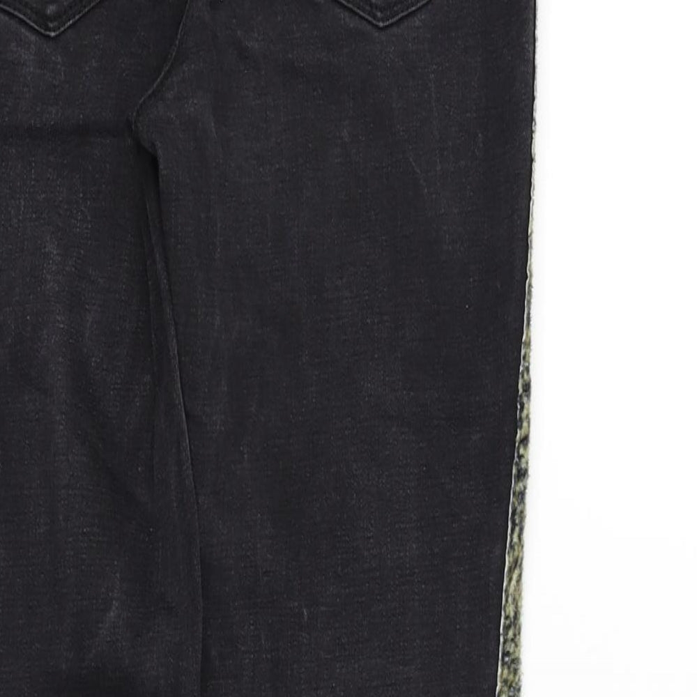 Brand and care label for Candy girls’ black straight jeans, size 13, years