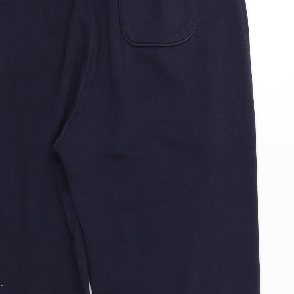 Brand and care label for ACW85 women’s blue jogger trousers, size M, 27-inch leg