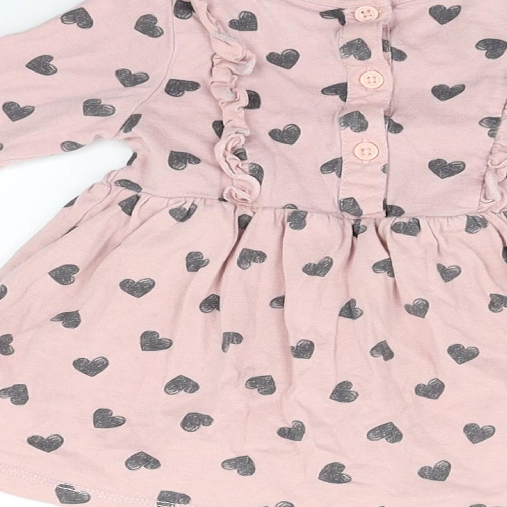 Brand and care label for Matalan Baby Pink Polka Dot Fit & Flare, size 3-6, Months