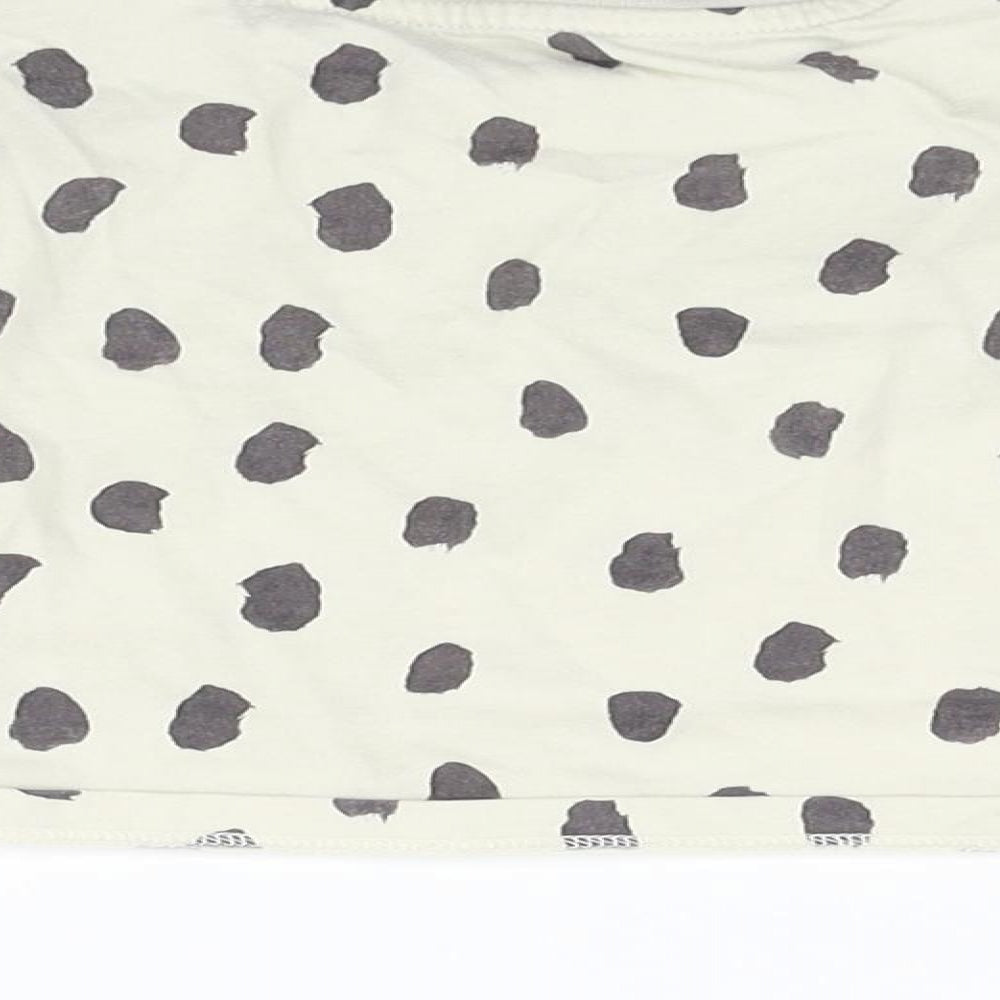 Brand and care label for Marks & Spencer boys’ black polka dot basic t-shirt, size 3-6, months