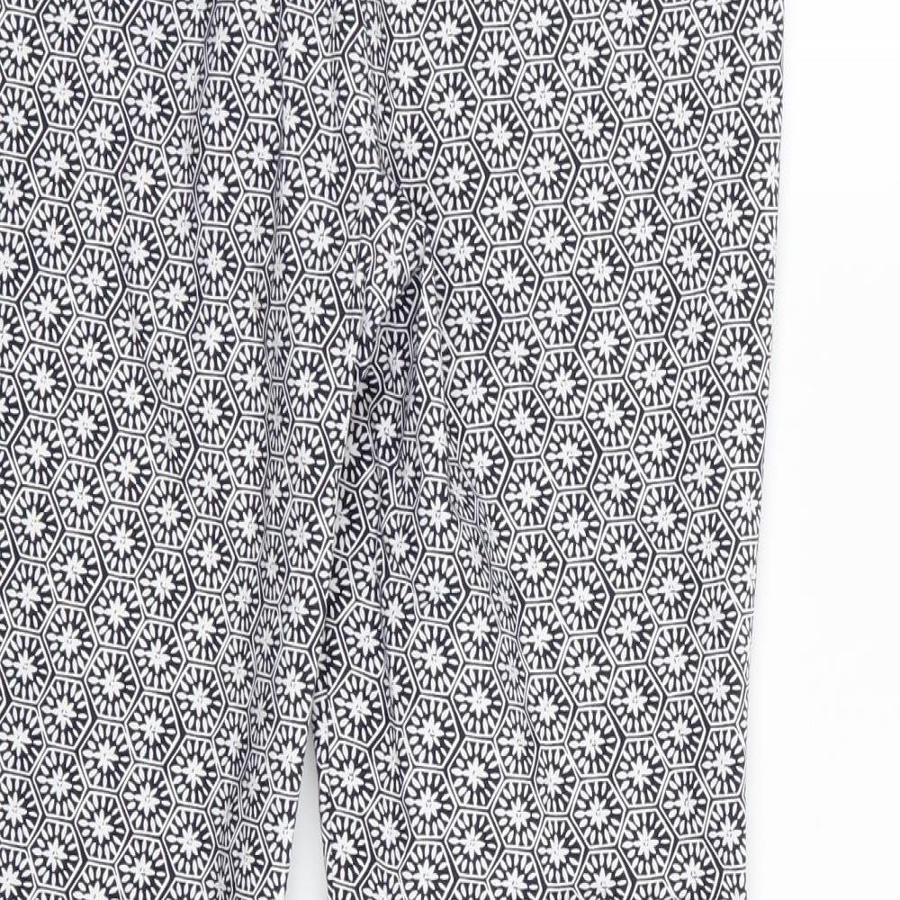Brand and care label for Dorothy Perkins women’s blue geometric trousers, size UK 10, 26-inch leg