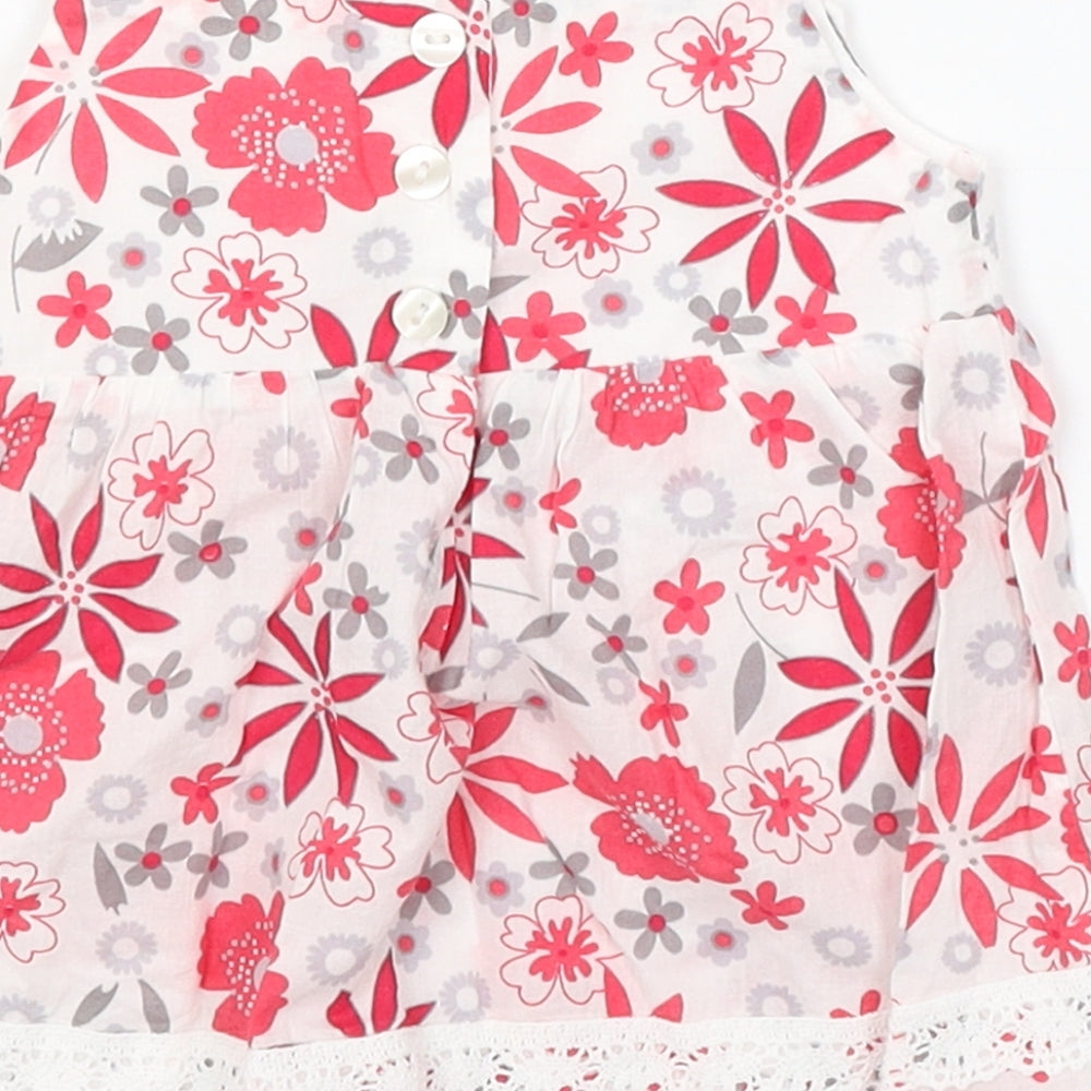 Brand and care label for M&Co Baby White Floral Fit & Flare, size 3-6, Months