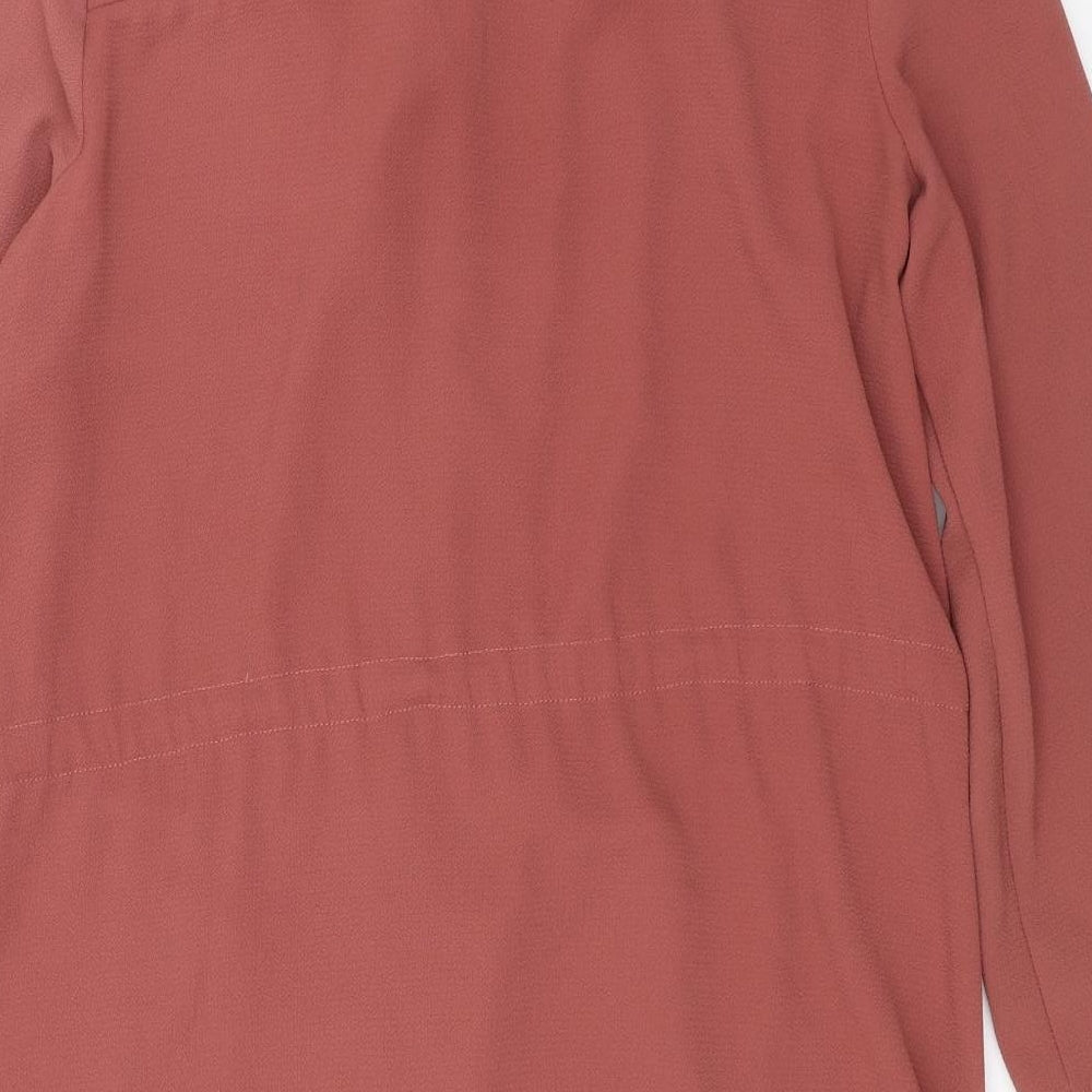 Brand and care label for Primark women’s pink overcoat jacket, size UK 14