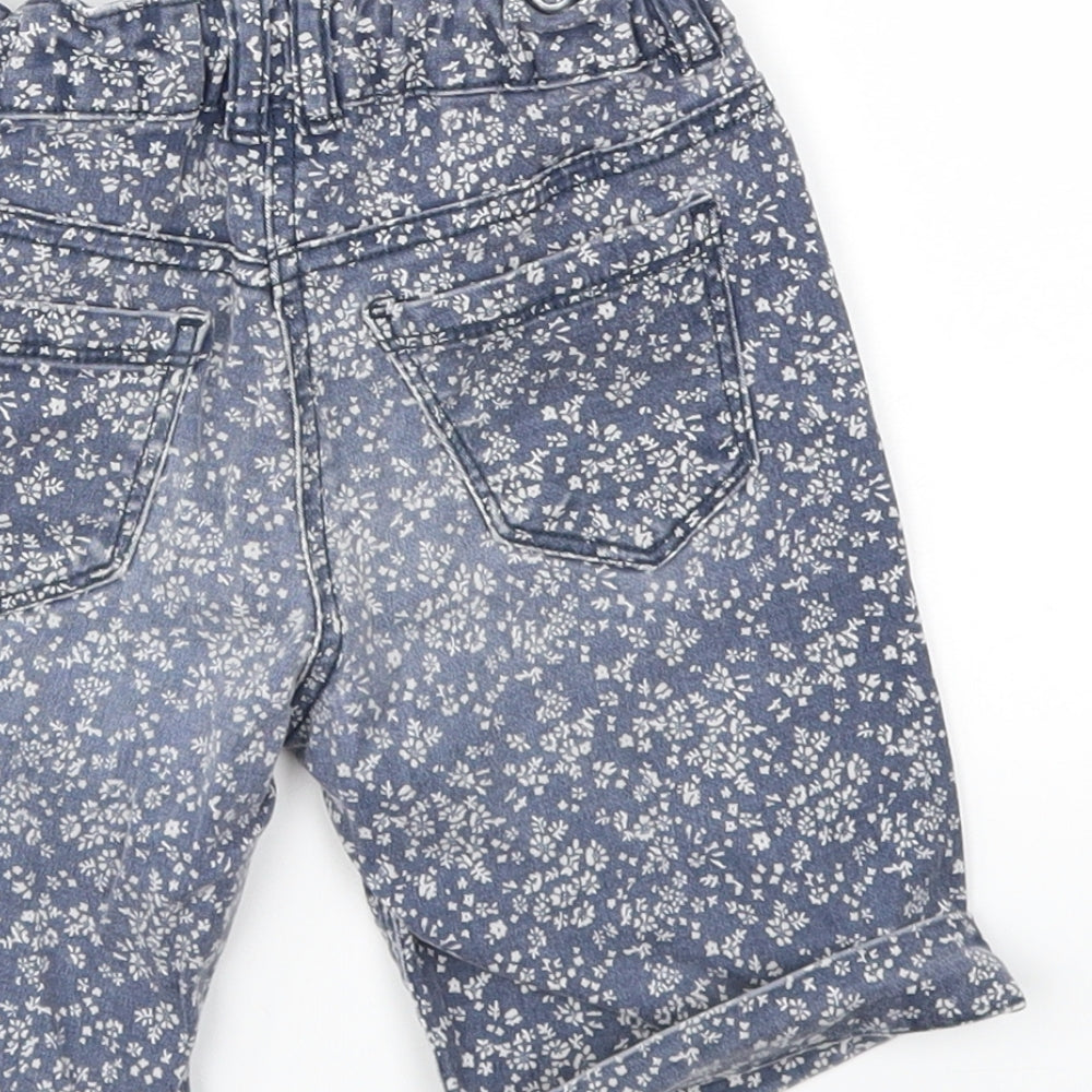Brand and care label for Matalan girls’ blue floral skinny jeans, size 6-7, years