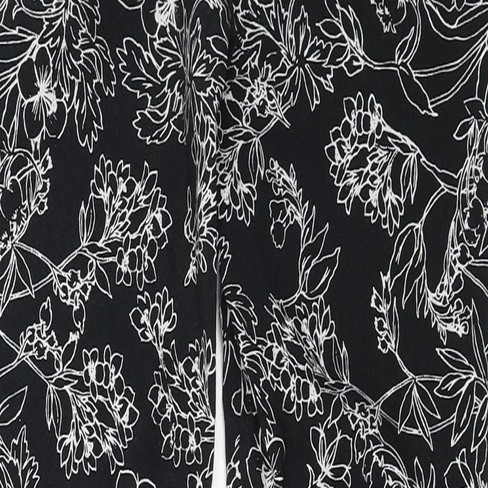 Brand and care label for George women’s black floral straight jeans, size UK 8, 26-inch leg