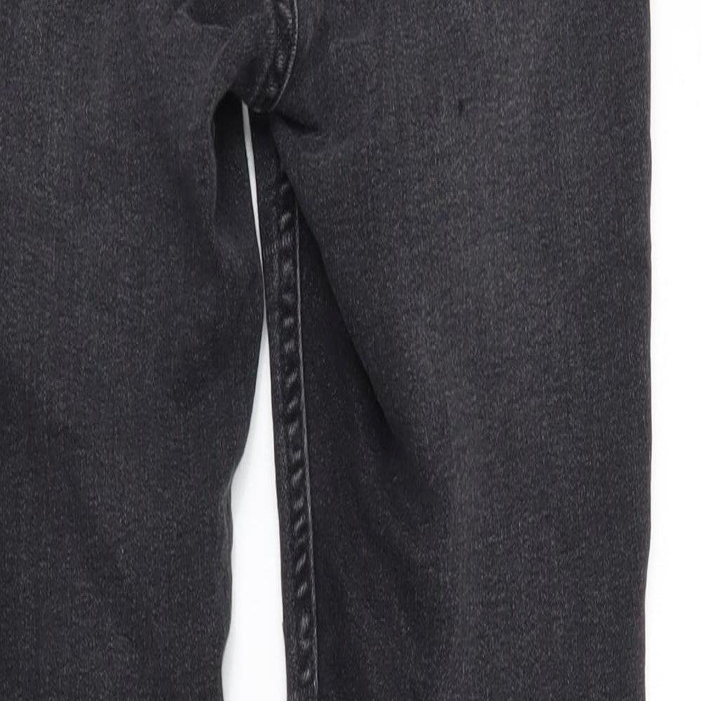 Brand and care label for Divided women’s black denim skinny jeans, size UK 6, 26-inch leg