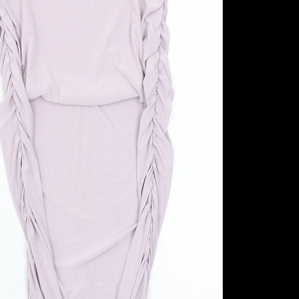 Brand and care label for Boohoo women’s purple a-line skirt, size UK 12