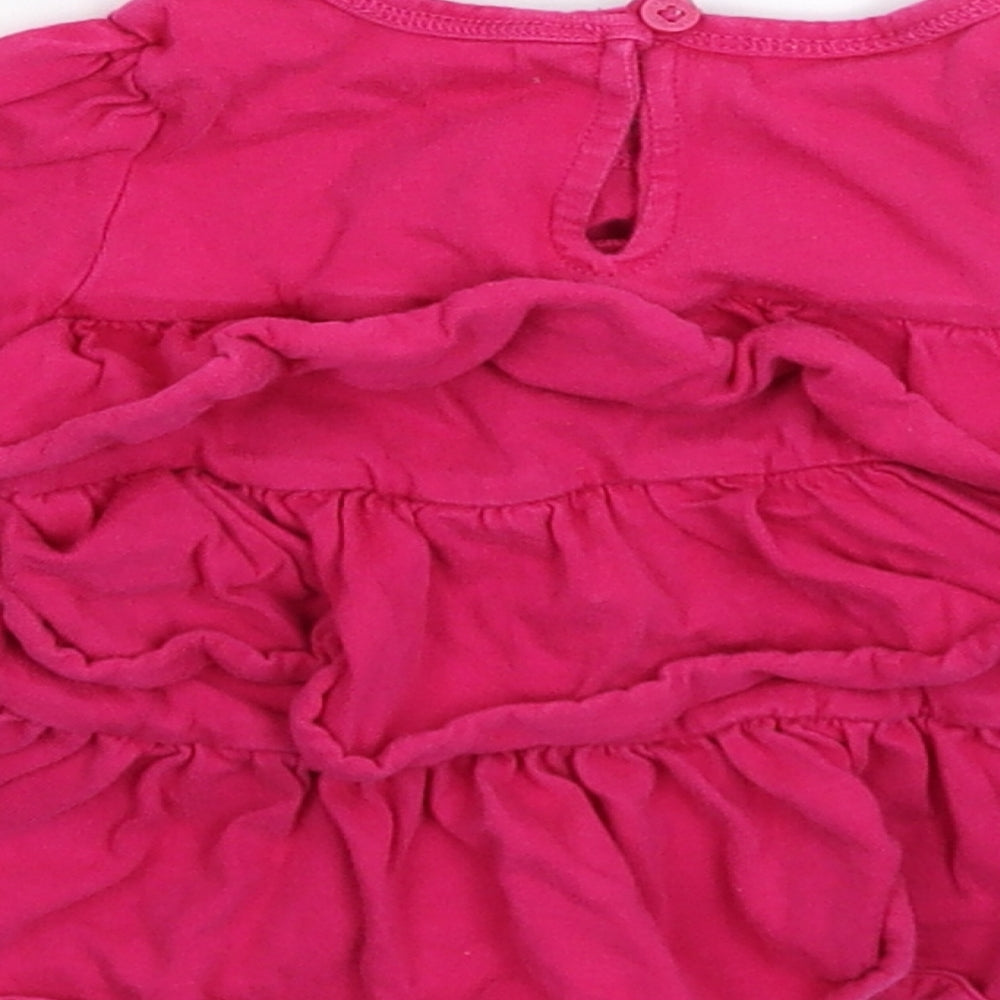 Brand and care label for Gap girls’ pink fit & flare, size 9-12, months