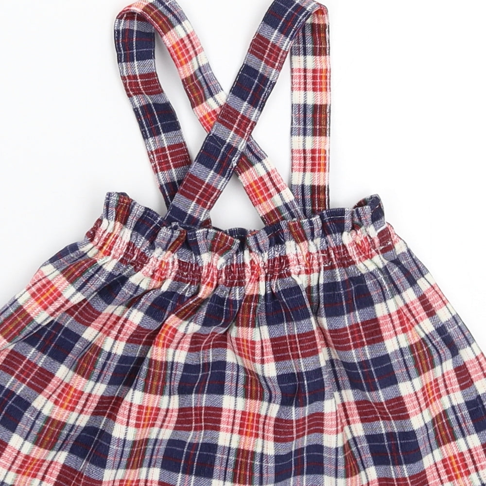Brand and care label for George girls’ multicoloured check flare skirt, size 0-3, months