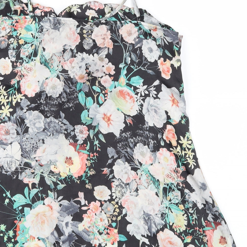 Brand and care label for River Island women’s black floral camisole blouse, size UK 8