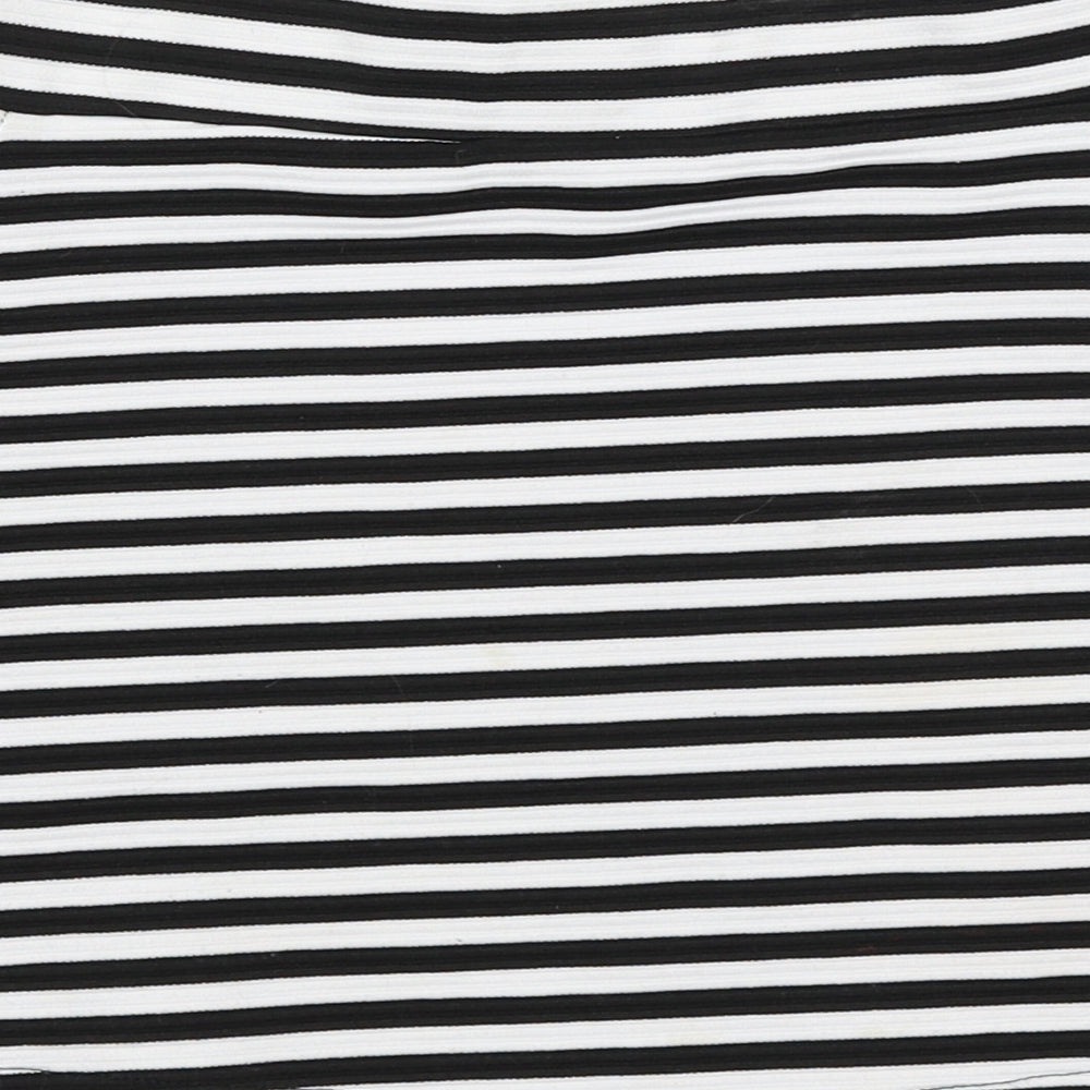Brand and care label for George girls’ black striped mini skirt, size 6-7, years