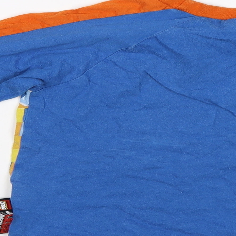 Brand and care label for Character.com boys’ blue jersey t-shirt, size 3-4, years - lego movie