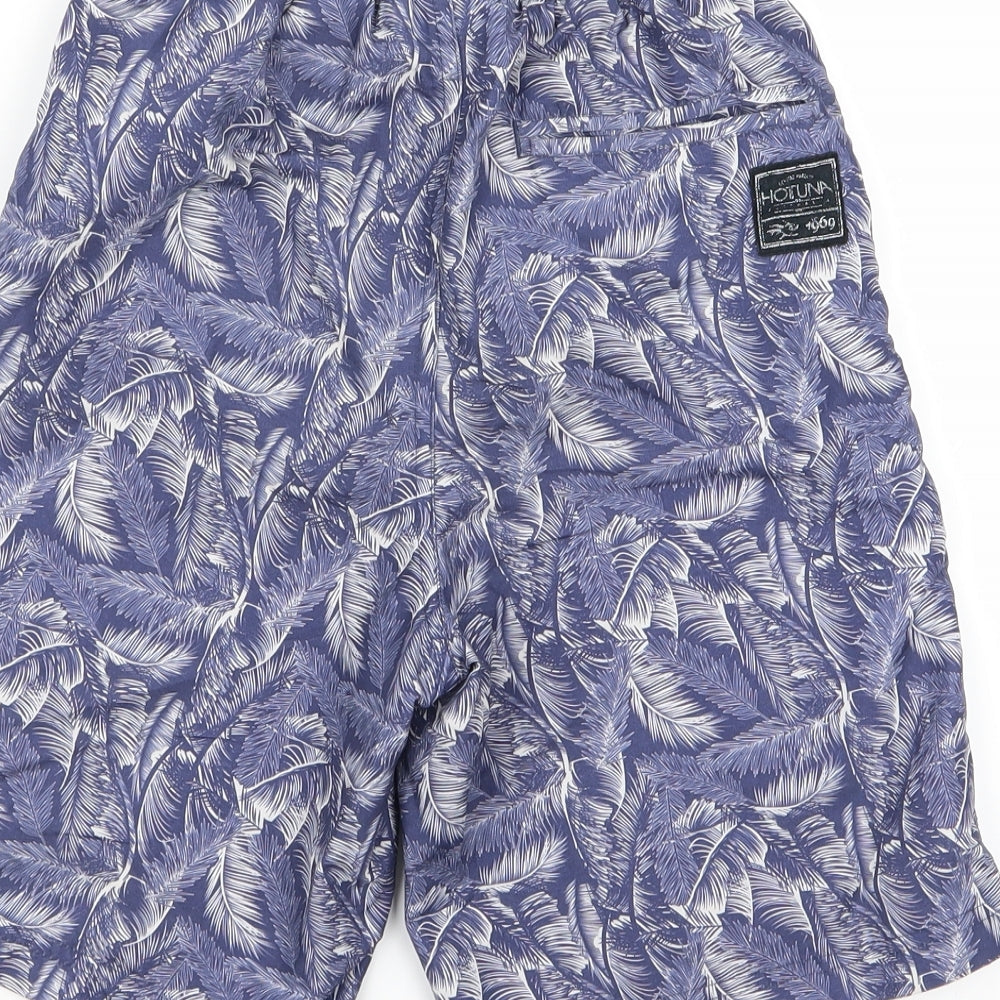 Brand and care label for preoworn boys’ blue floral ramie bermuda shorts, size 7, years