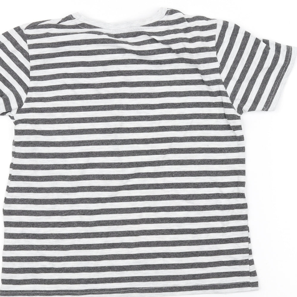Brand and care label for Primark girls’ white striped basic t-shirt, size 7-8, years