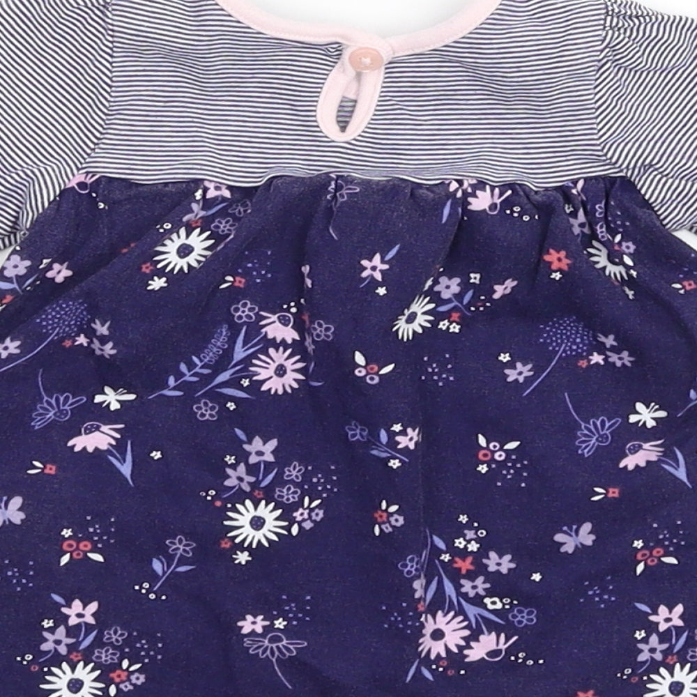 Brand and care label for George girls’ blue floral t-shirt dress, size 0-3, months