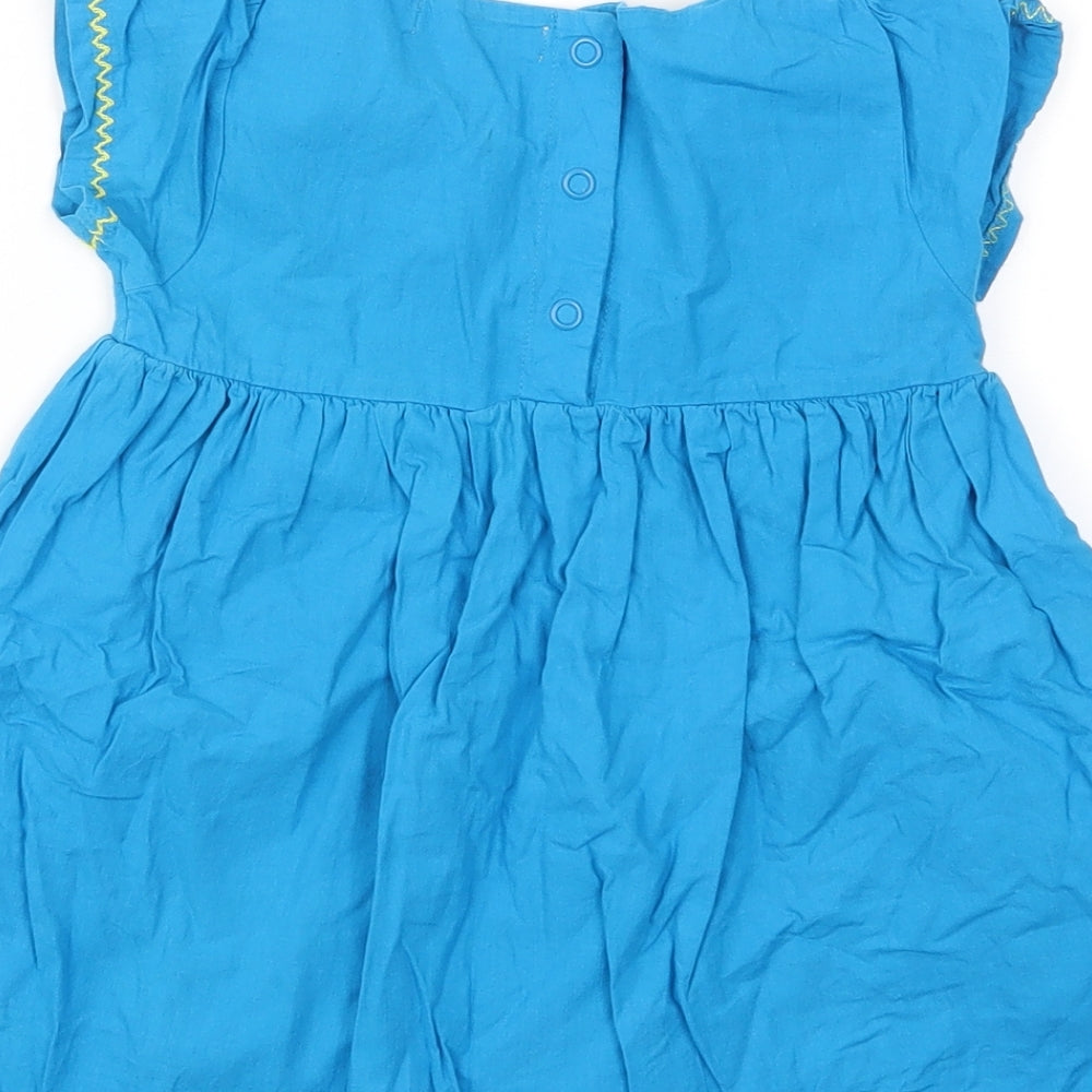 Brand and care label for Butterfly girls’ blue animal print fit & flare, size 12-18, months