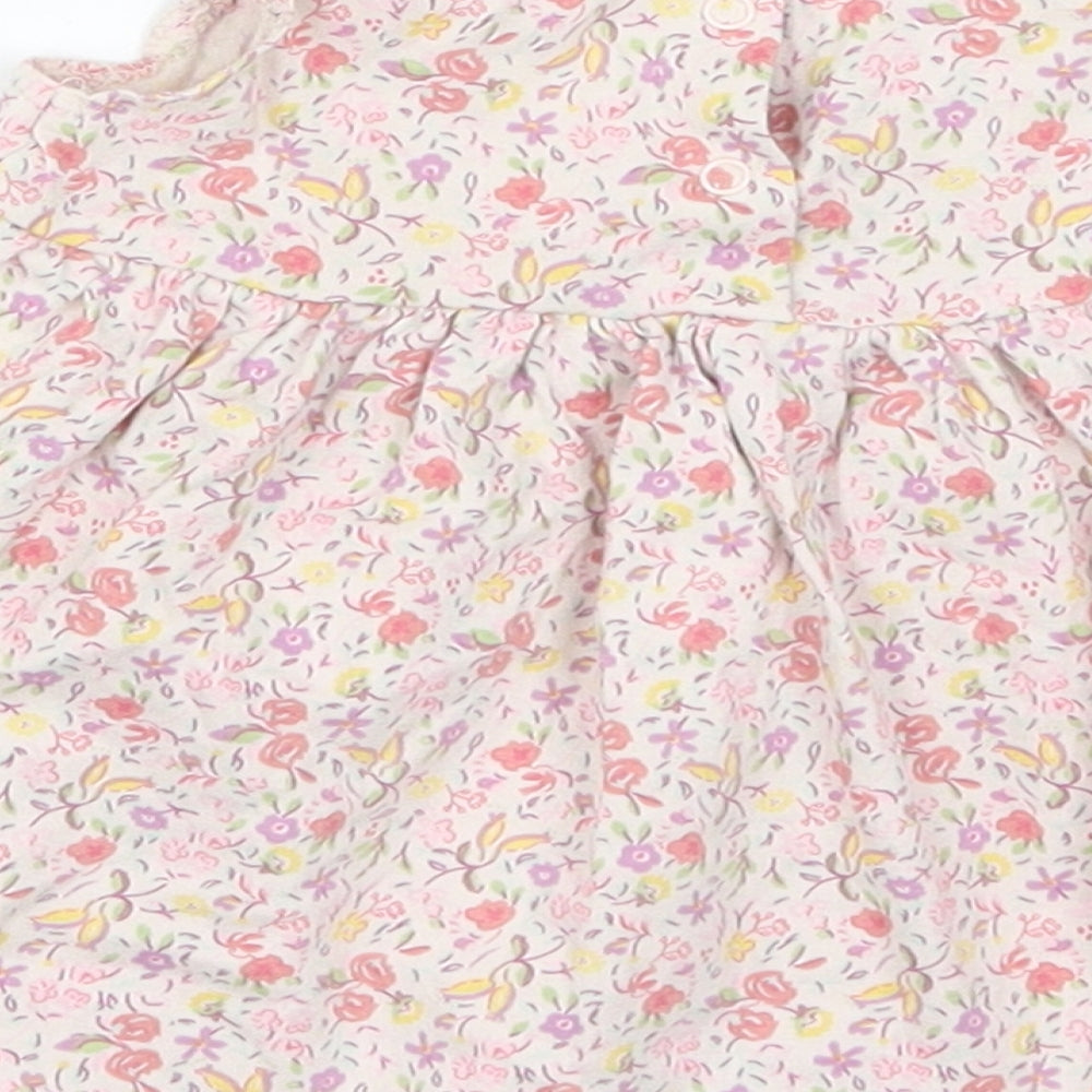 Brand and care label for Next girls’ pink floral skater dress, size 3-6, months