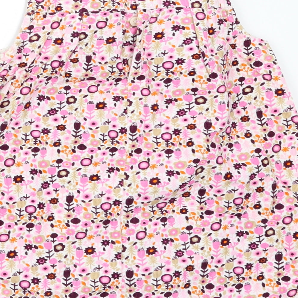 Brand and care label for H&M girls’ pink floral corduroy pinafore/dungaree dress, size 12-18, months