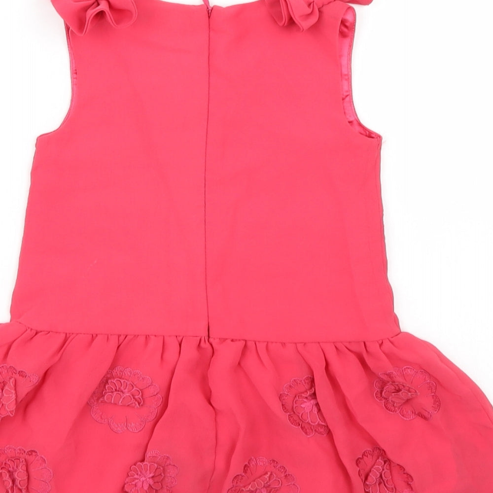 Brand and care label for Rocha Little Rocha girls’ red floral a-line, size 12-18, months