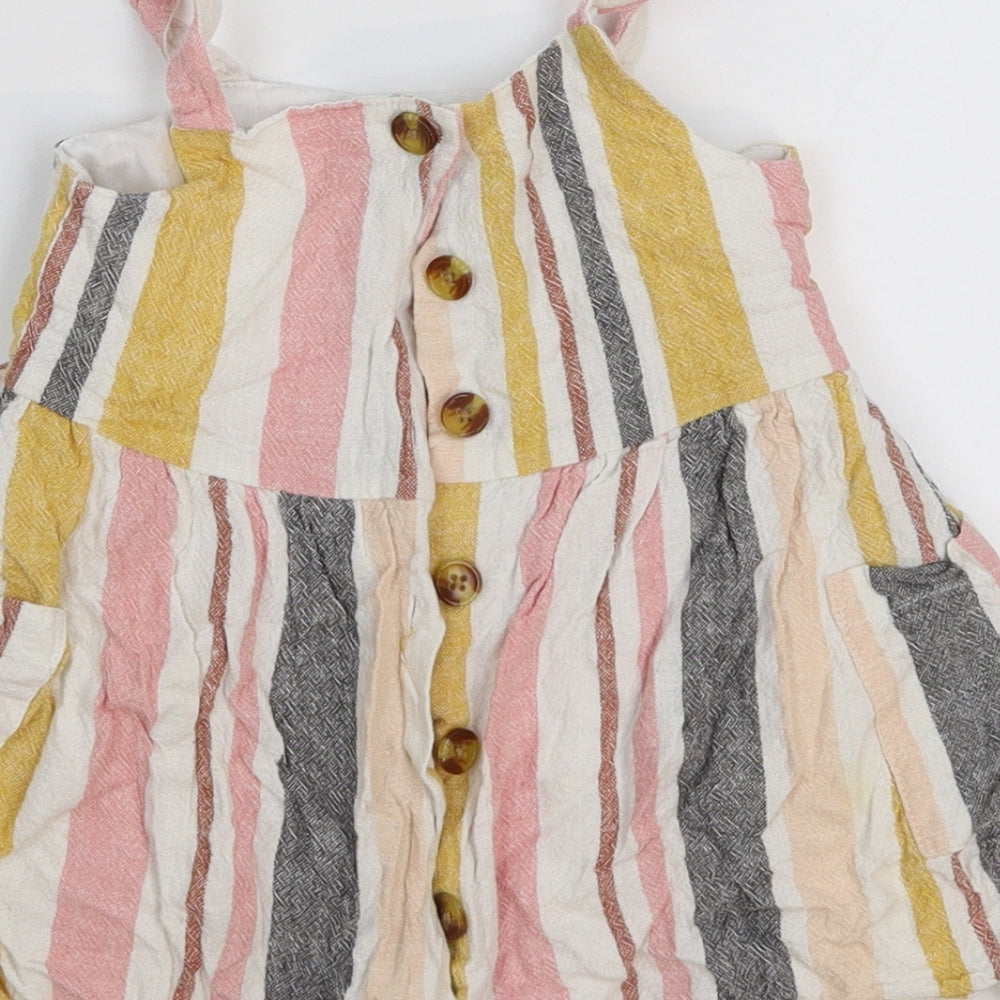 Brand and care label for Primark girls’ multicoloured striped pinafore/dungaree dress, size 18-24, months