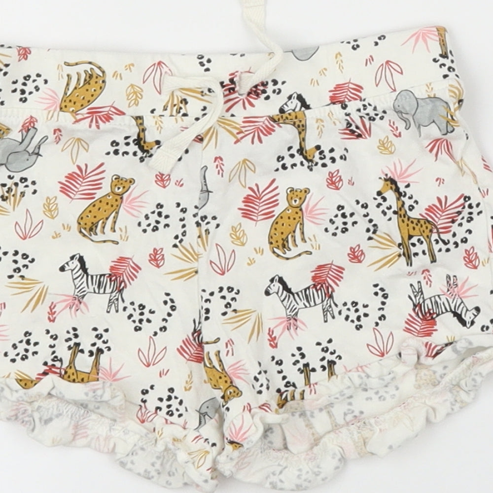 Brand and care label for Primark girls’ beige animal print capri leggings, size 12-18, months - shorts