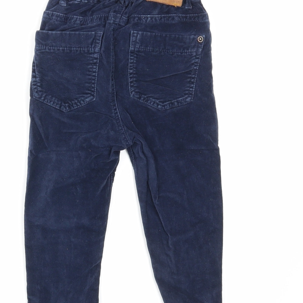 Brand and care label for Babaluno Baby Blue Denim Capri Jeans, size 12-18, Months