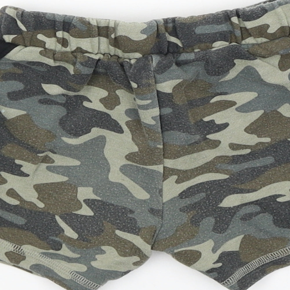 Brand and care label for F&F Baby Green Camouflage Cropped Trousers, size 18-24, Months
