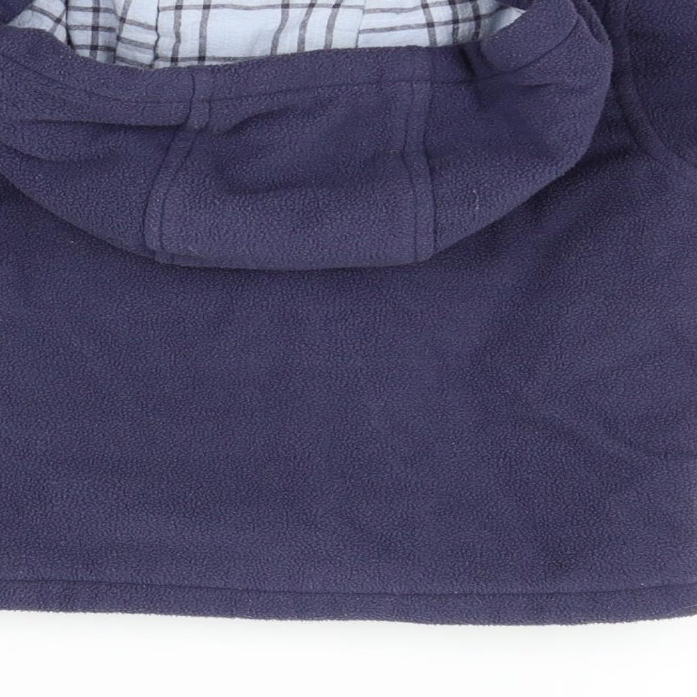 Brand and care label for M&Co girls’ blue jacket, size 12-18, months