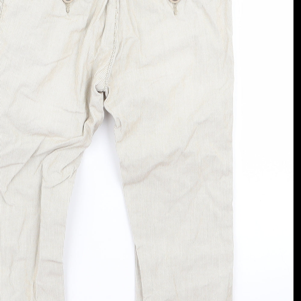 Brand and care label for Preworn Baby Beige Track Pants Trousers, size 12, Months