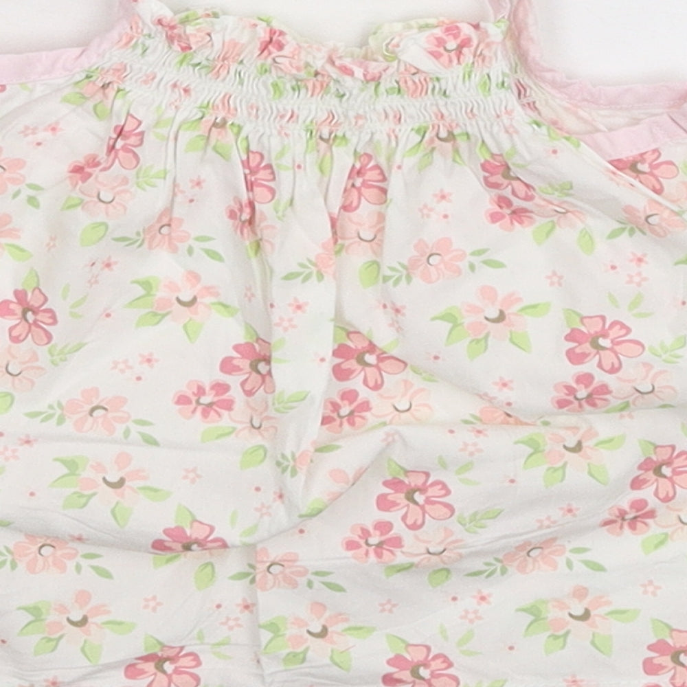 Brand and care label for Mini Club girls’ white floral tank dress, size 3-6, months