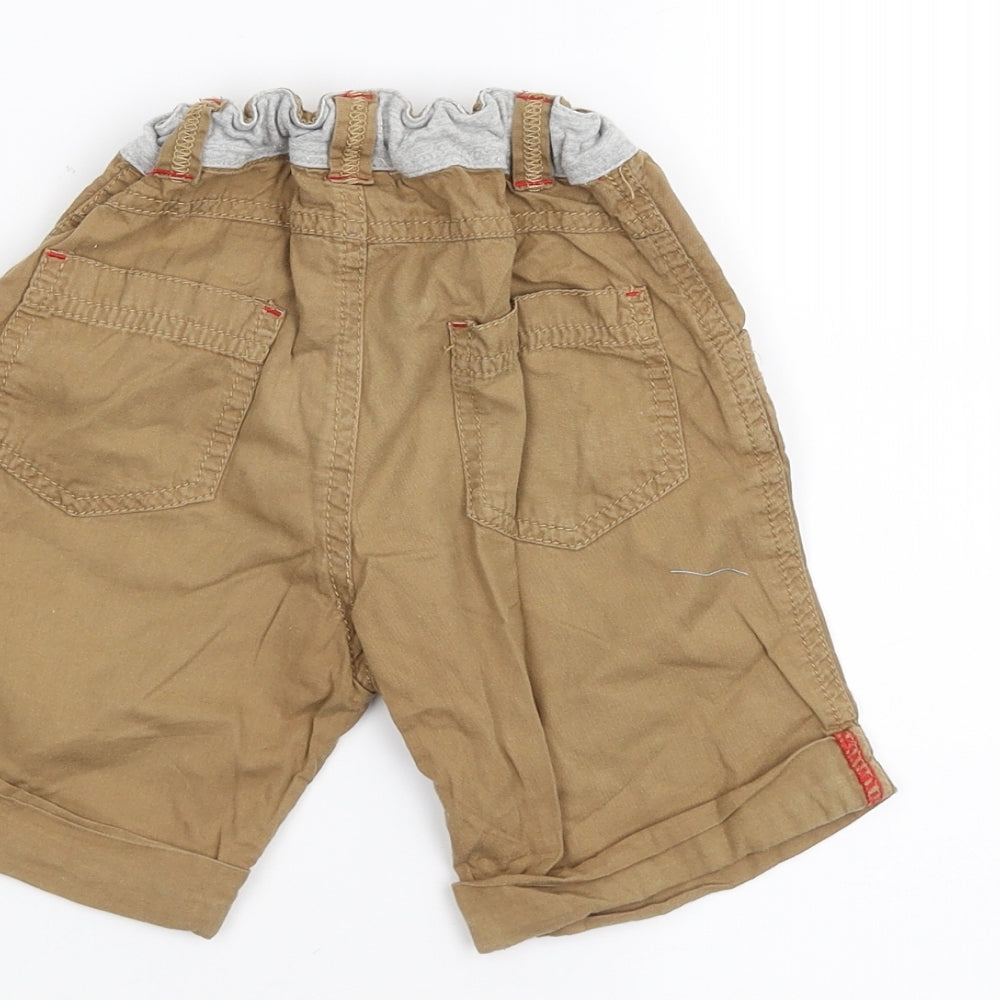 Brand and care label for Mini Club Baby Brown Cropped Trousers, size 18-24, Months